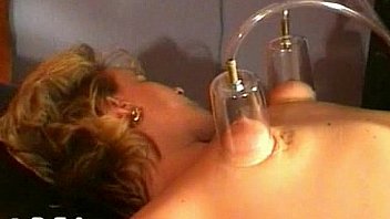 Horny slave gets her tits and pussy vacuum sucked by master