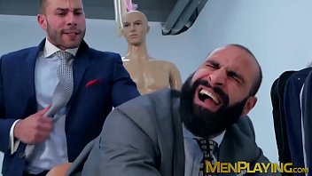 Gay man tries on a suit before fucking