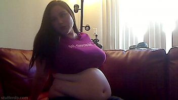 Sexy BBW MILF stuffs her belly