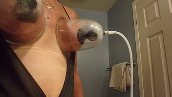 Cross dresser pumping tits.