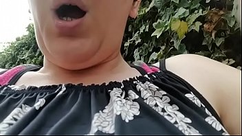 Your beautiful Italian smashes her pussy with this huge dildo in a green public place