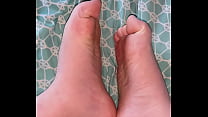DEEDEE wiggles her chubby little toes and flexes her feet to show off arches