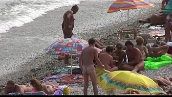 Voyeur girl naked on public beach