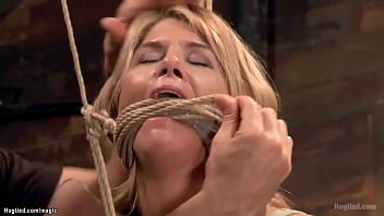 Huge tits blonde MILF slave Carissa Montgomery takescrotch rope tied to heavy metal balls and gagged with rope then in hogtie suspension toyed