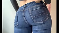 Squeezing her booty in jeans, more at 